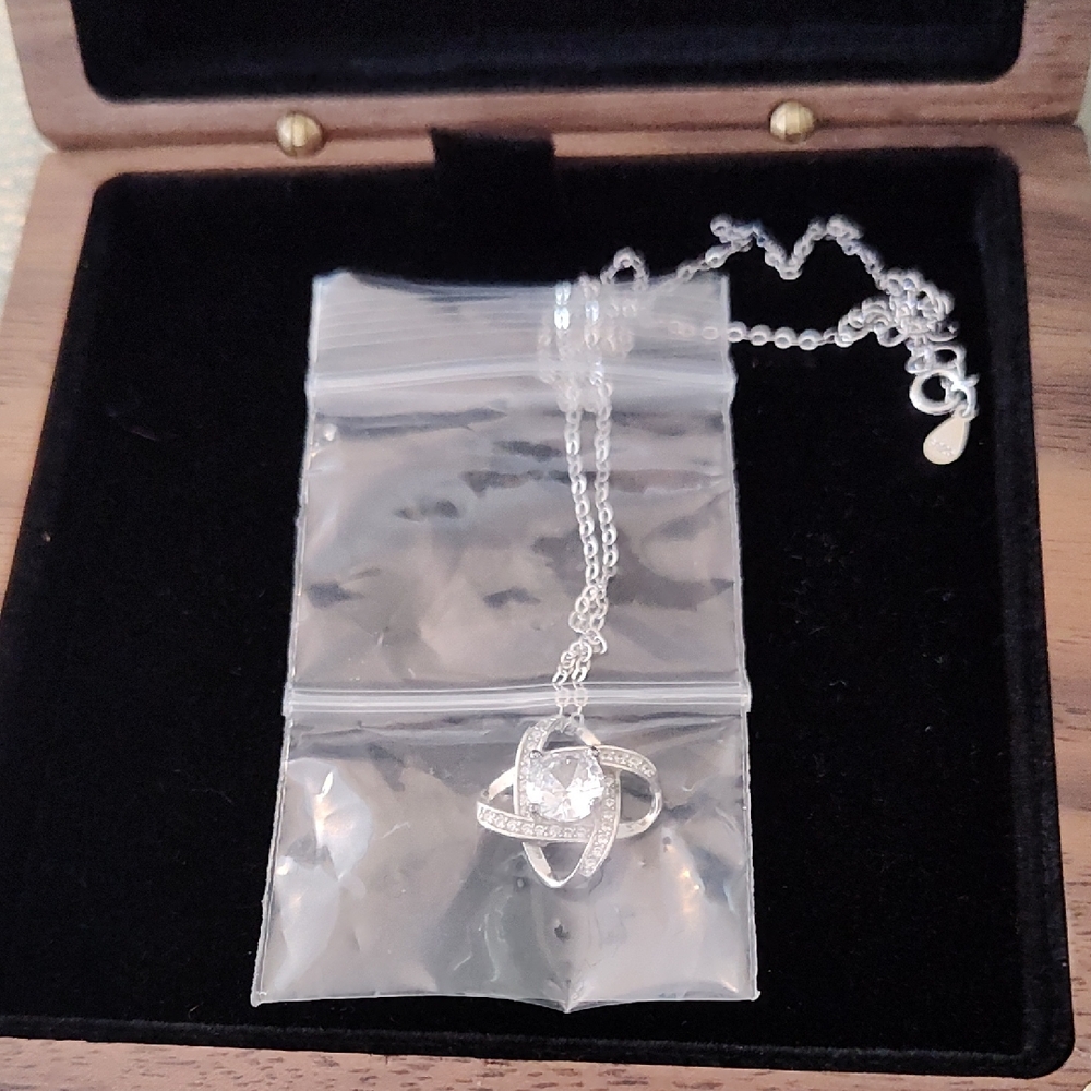 Elegant Sterling Silver  Necklace with Knot Pendant